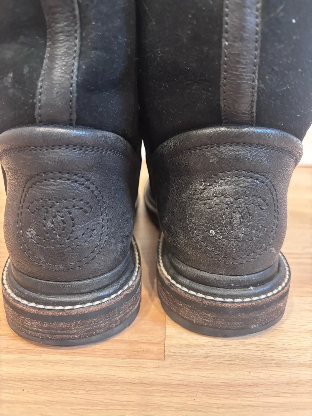 CHANEL black leather & suede boots with an embossed CC logo on heel size 37